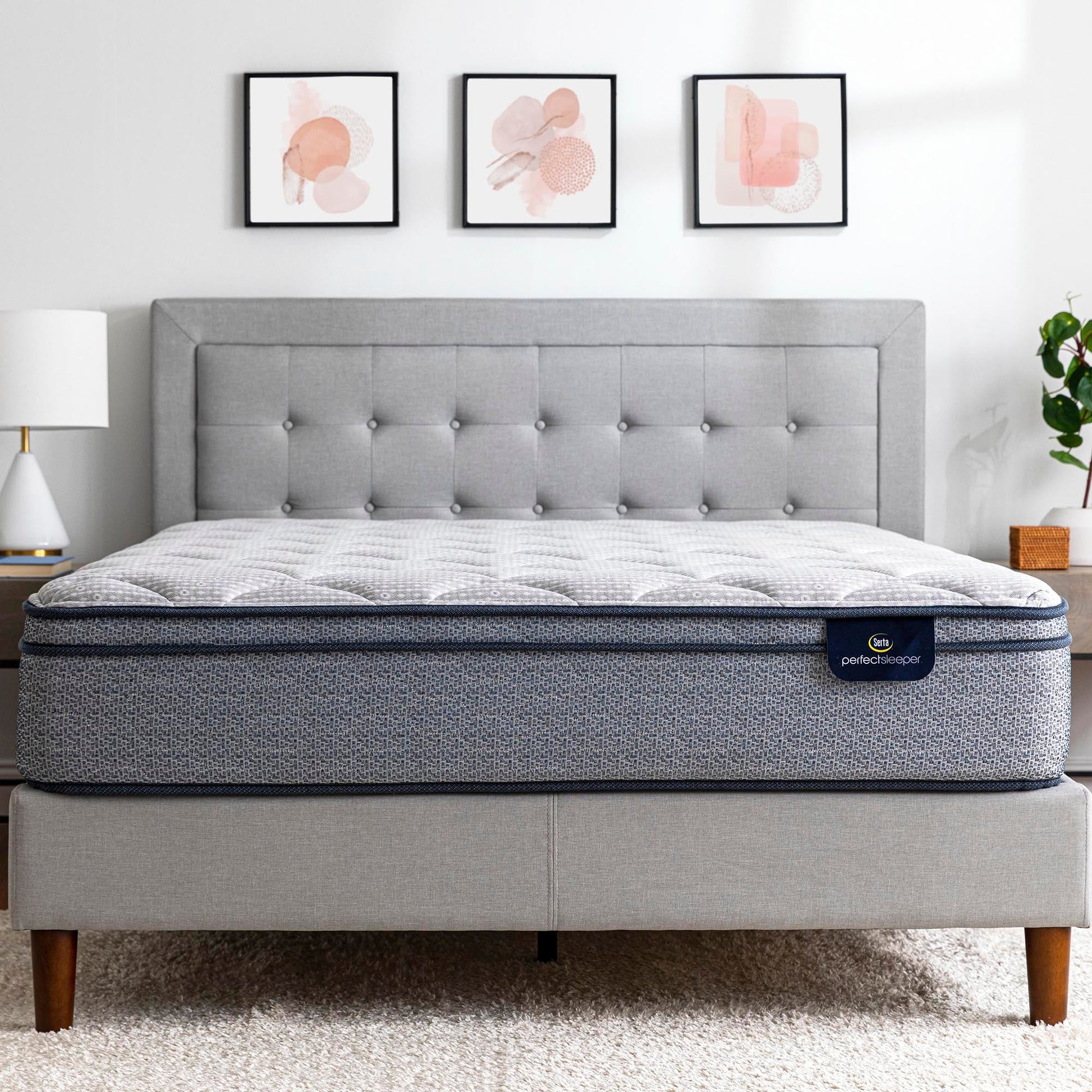 Serta Perfect Sleeper Charlotte 10.5 inch Plush Euro Top Mattress in a bedroom on a grey bed