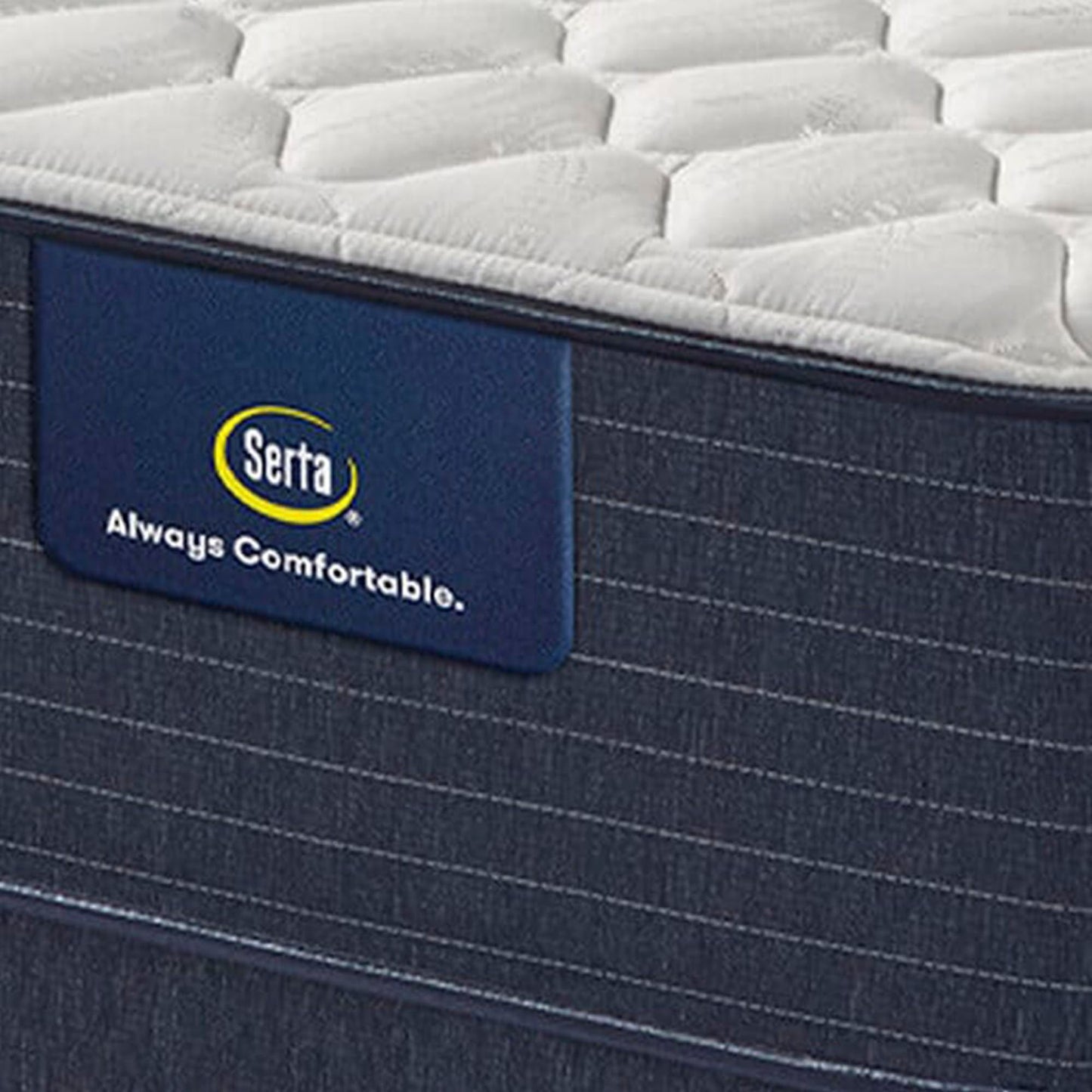 Corner view, showing label for a Serta Classic Firm 10.5"