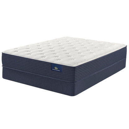 The Serta Classic Plush 11" on top of a foundation, alone on a white background