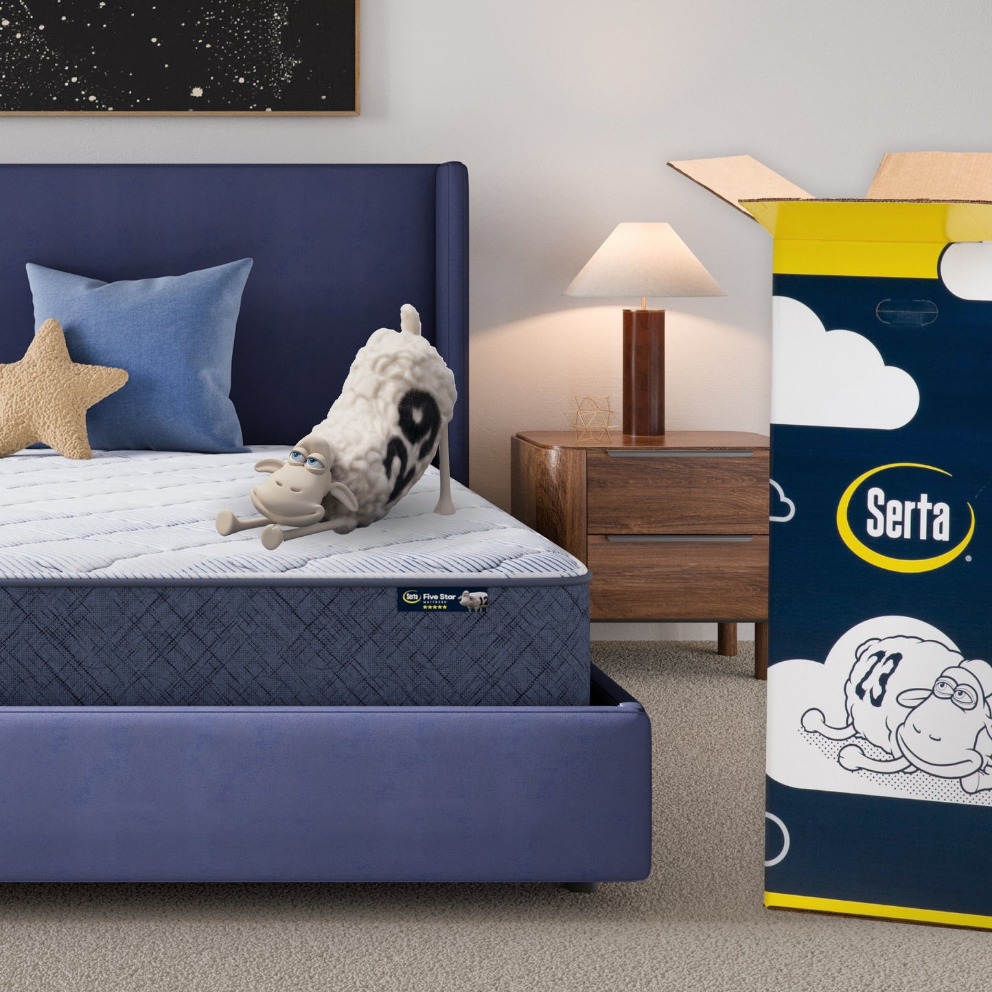 10 medium inch mattress in a blue bedframe with a Serta sheep with a number on top of it with the Serta packaging to the right of the bed