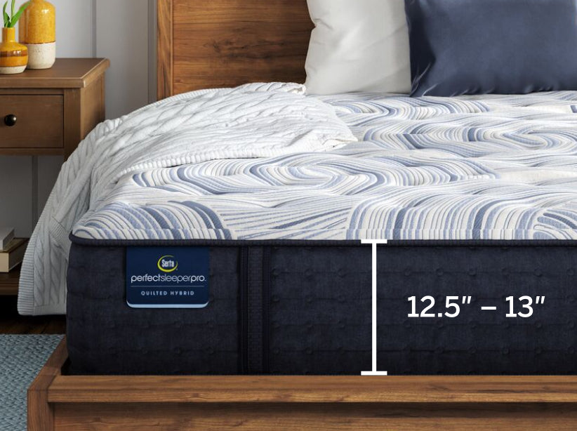 Serta perfect sleeper pro Level 1 mattress sitting in a brown bed frame with an illustration of the thickness size of the mattress 12.5" - 13" 