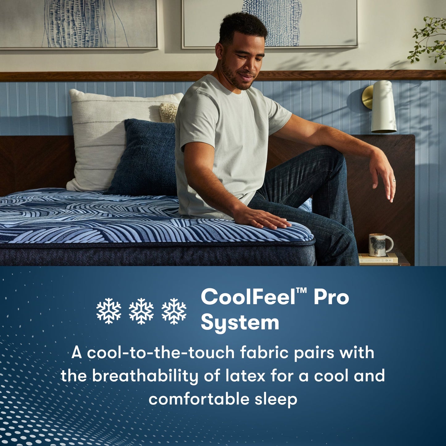 Man sitting on the right side of a Perfect Sleeper Pro Valais Plush Pillow Top Mattress feeling the cool to the touch top of the mattress || Level: Level 3 || Feel: Plush Pillow Top

