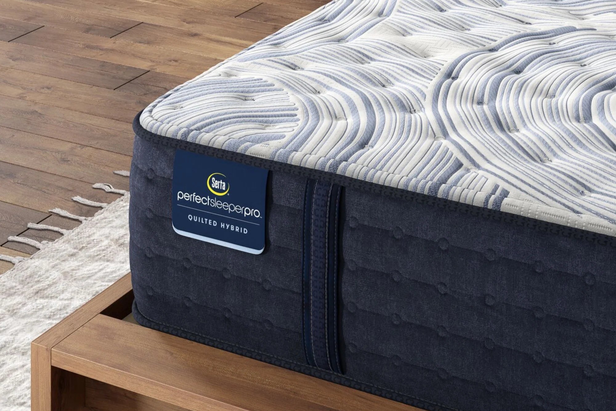 Close-up of a Serta Perfect Sleeper Pro Extra Firm mattress, highlighting its extra firm support, zoned latex foam, and cooling system.