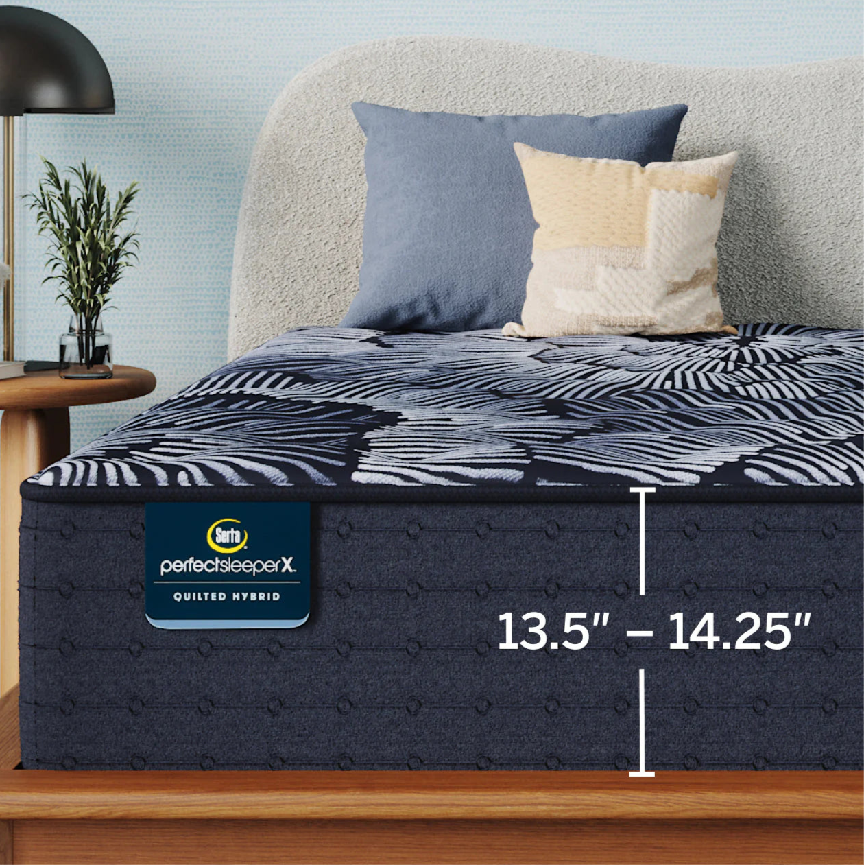 Close up of Perfect Sleeper X Level 1 quilted mattress with graphic overlay that displays the mattress height s between 13.5 inches to 14.25 inches based on your customizations
