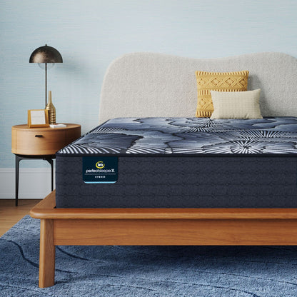 Perfect Sleeper X Hybrid Kendall Plush Mattress sitting in a brown bedframe || feel: Plush || level: Level 1