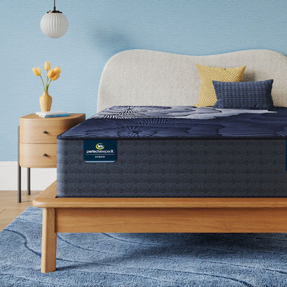 Perfect Sleeper X Hybrid Prescot Medium Firm Mattress sitting in a brown bedframe || feel: Medium Firm || level: Level 2