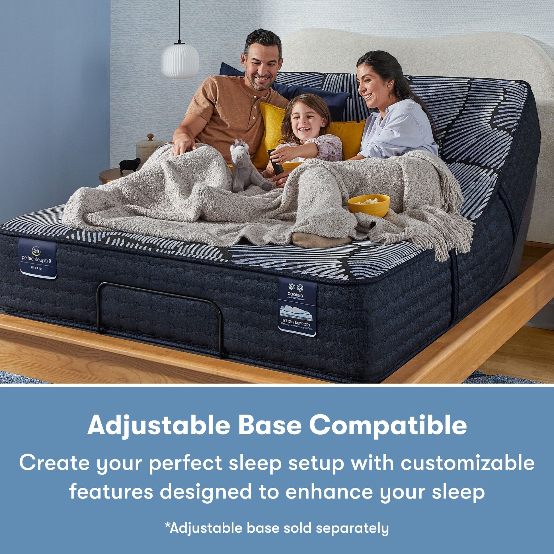 Family of 3 sitting on a Perfect Sleeper X Hybrid Kendall Plush Mattress sitting in the an adjustable base frame || feel: Plush || level: Level 1