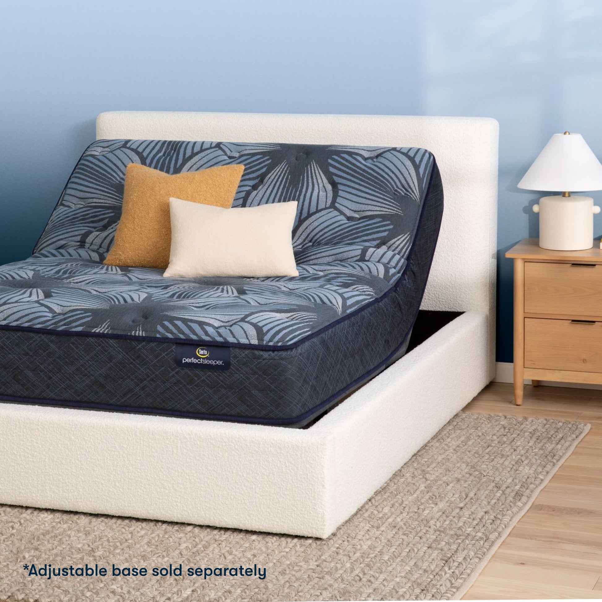 The Serta Perfect Sleeper Sleep Excellence mattress in a bedroom on the Serta adjustable base | feel: Extra Firm