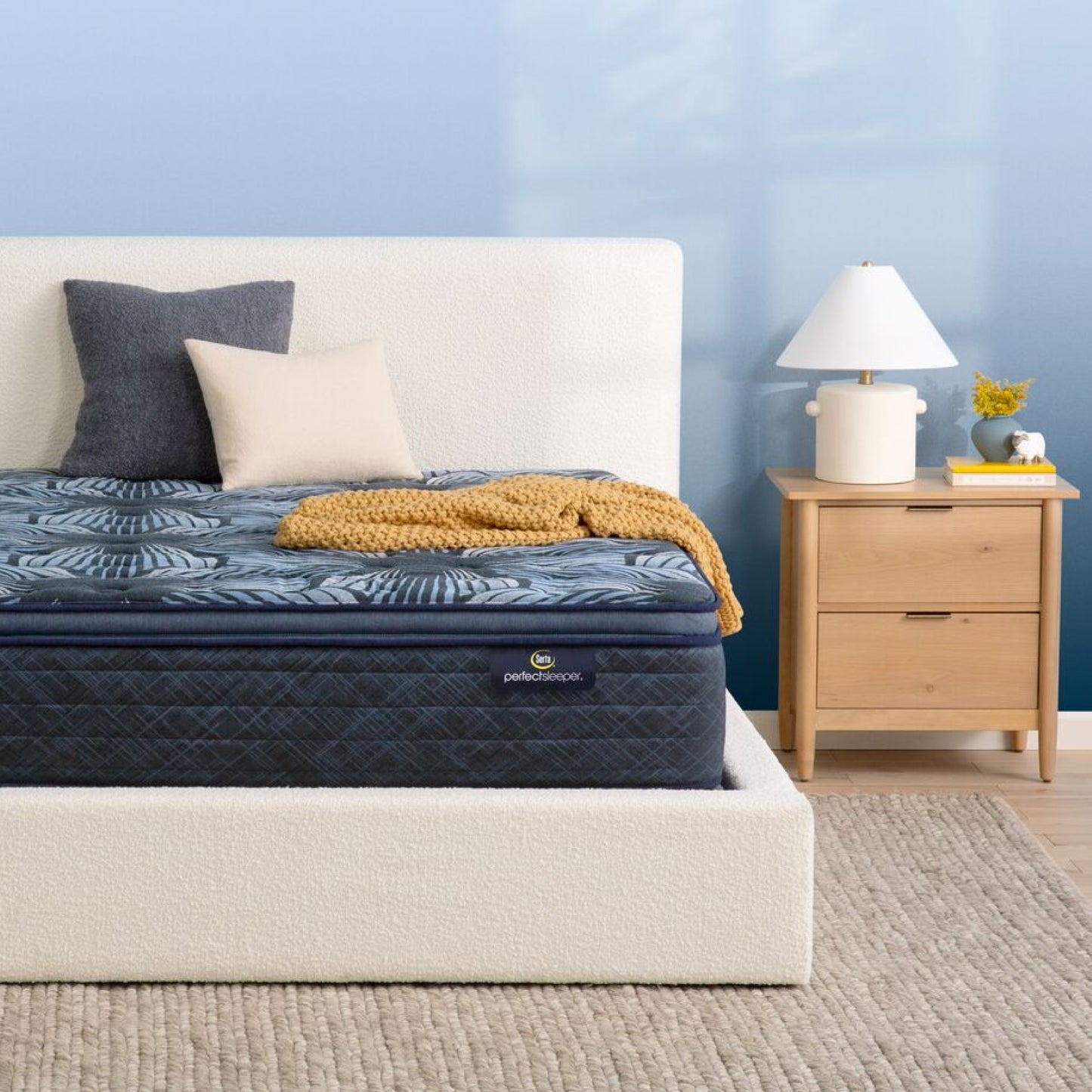 The Serta Perfect Sleeper Sleep Excellence mattress in a bedroom on a white bed | feel: medium pillow top