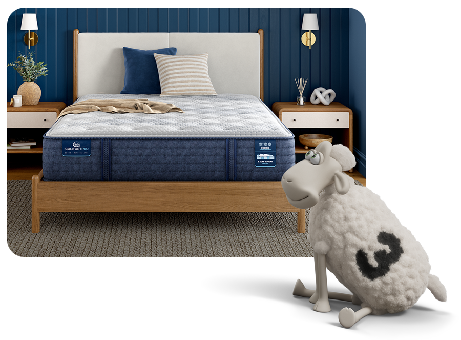 Serta  mattress on a bedroom in a serene blue bedroom. A Serta sheep overlays this image smiling.